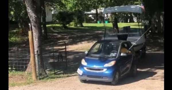Watch A Smart ForTwo Driver Back Boat Out Of The Driveway